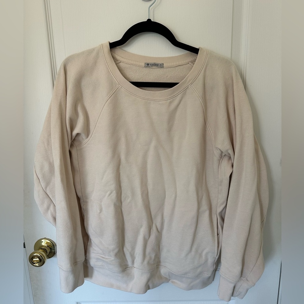 forever 21 crewneck, size medium in the color cream.